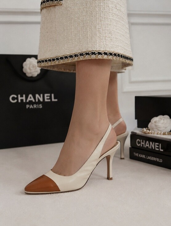 CHANEL Shoes - CHANEL Two-Tone Slingback Pumps in Cream & Brown